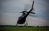 Helicopter landing. Free public domain CC0 photo.