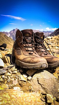 Hiking shoes on a ground. Free public domain CC0 image.
