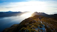 Travelers hiking in mountain. Free public domain CC0 photo.