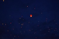 Floating lantern in the sky. Free public domain CC0 photo.