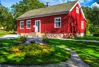 Traditional Swedish red house during summer. Free public domain CC0 photo.