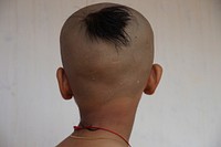 Young Asian monk. Free public domain CC0 photo.