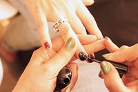 Woman getting manicure. Free public domain CC0 photo.