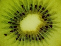 Closeup on fresh cut up kiwi. Free public domain CC0 photo.