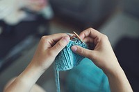 Woman knitting, background photo. Free public domain CC0 image.