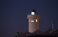 Lighthouse during nighttime. Free public domain CC0 image.