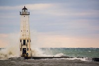 Lighthouse in middle of ocean. Free public domain CC0 image. 