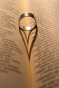 Ring on a book, wallpaper background. Free public domain CC0 photo.