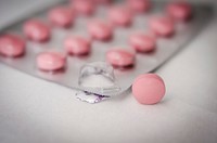 Pink pills. Free public domain CC0 photo.