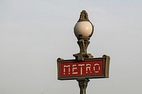 Metro sign in Paris, France. Free public domain CC0 image.
