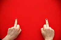 Middle fingers, background photo. Free public domain CC0 image.