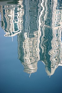 Reflection of skyscrapers on water. Free public domain CC0 image.