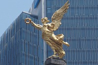 Statue of goddess of Fama or Pheme, Academy of Art in Dresden, Saxony, Germany. Free public domain CC0 photo.