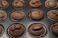 Chocolate muffin in baking tray. Free public domain CC0 photo.