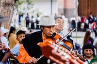 Peruvian street musician performing - unknown date & location