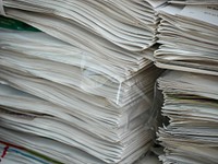 Stack of white papers. Free public domain CC0 photo.