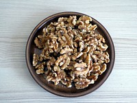 Fresh walnuts ready to eat in a bowl. Free public domain CC0 image.