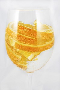 Orange skin in a wine glass. Free public domain CC0 photo