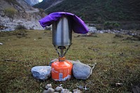 Boiling water during camping. Free public domain CC0 image.