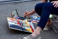 Street artist painting outdoors. Free public domain CC0 photo.