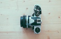 Analog camera on table. Free public domain CC0 image.