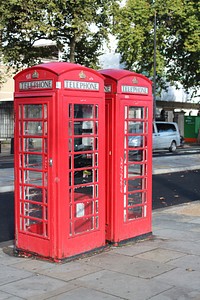 Iconic red phone booth in London, England. Free public domain CC0 photo.