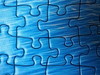 Blue jigsaw puzzle pattern. Free public domain CC0 image.