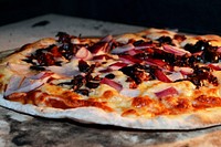 Closeup on pizza with toppings. Free public domain CC0 photo.