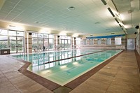 Empty indoor swimming hall. Free public domain CC0 photo.