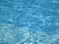 Clear blue pool water. Free public domain CC0 photo.