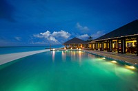 Swimming pool of a hotel near beach. Free public domain CC0 photo.