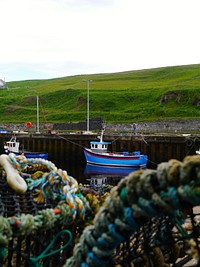 Fishing boats at dock. Free public domain CC0 photo.