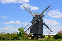 Old windmill in countryside. Free public domain CC0 photo.