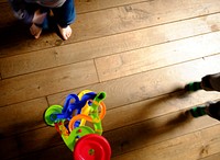 Toys on floor, background photo. Free public domain CC0 image.