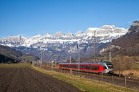 Moving train on a track. Free public domain CC0 photo.