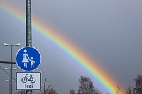 Rainbow on cloudy sky. Free public domain CC0 photo.