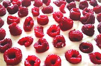 Fresh raspberries on cake with cream. Free public domain CC0 image. 