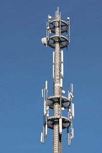 Telecommunications tower with antennas. Free public domain CC0 photo.