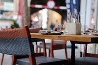 Outdoor restaurant tables. Free public domain CC0 photo.