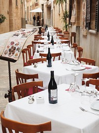 Outdoor restaurant tables. Free public domain CC0 photo.