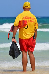 Lifeguard at the beach. Free public domain CC0 photo.