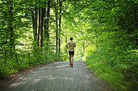 Jogging in the forest. Free public domain CC0 photo.