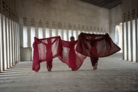 Three monks in Red Dress, Myanmar. Date unknown.