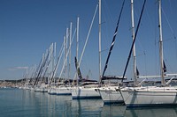 Yacht docking by the marina. Free public domain CC0 photo.