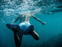 Snorkeling in sea. Free public domain CC0 photo.