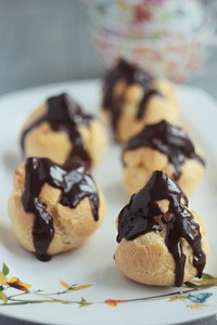 Choux with chocolate on top. Free public domain CC0 photo.