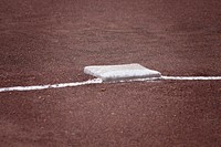 Closeup on baseball base. Free public domain CC0 image. 