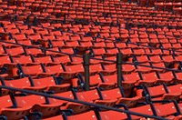 Closeup on red stadium seats. Free public domain CC0 image.