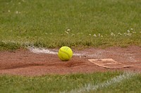 Softball on field. Free public domain CC0 photo.