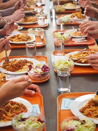 People eating in canteen. Free public domain CC0 photo.